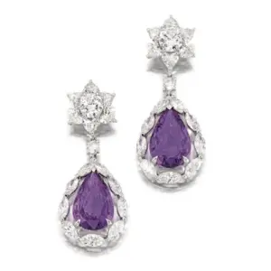 Two purplish pink sapphires mounted in pendent earrings